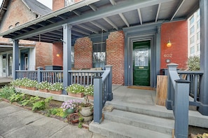 Front porch area provides nice place to enjoy a glass of wine on a summer eve. 