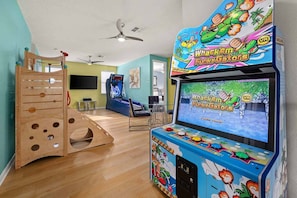 Loft w/ mini jungle gym and whack -em funky gators arcade in loft