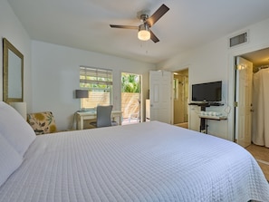 Bedroom north view with open door to patio.