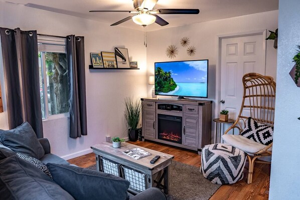 After a day at the beach, come get cozy in our charming living room area