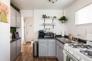 Kitchen heads in to the bathroom and bedroom area