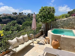 Seating area around the pool