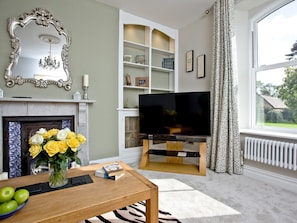 Comfortable living room with open fireplace | Veltham House Cottage, Bampton Nr Tiverton