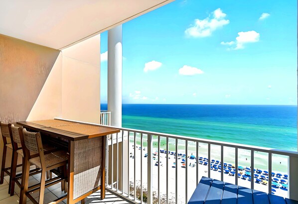 11th-floor beachfront balcony—breathtaking views and salty ocean breeze.