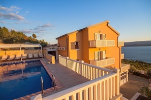 Villa Ana and pool area with 10 lounge chairs and shower