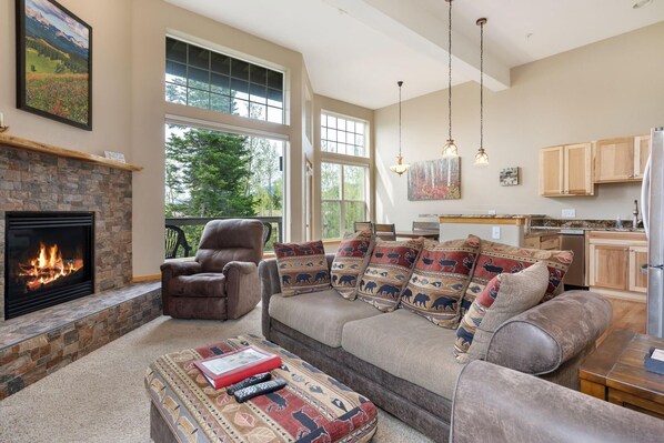 Natural Light Coming Through The Large Windows looking Onto Views!