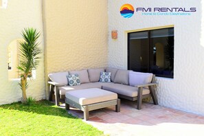 Terrace with outdoor furniture to enjoy a relaxing atmosphere.