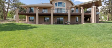 View of lower Garden Level entry and parking, I live upstairs, operate the ranch