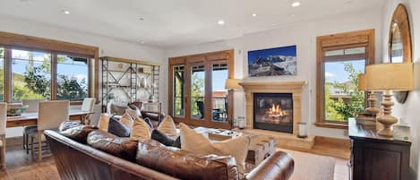 Designer touches throughout, living room with gas fireplace