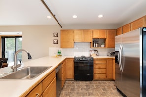 Modern kitchen with stainless steel appliances