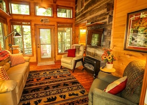 Watch a favorite tv show or curl up with a good book in this inviting living area.