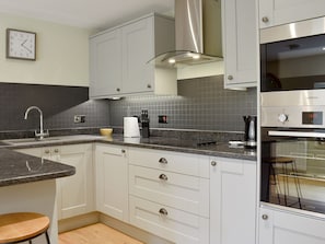 Well equipped kitchen/ dining area | Grooms Bothy, Nenthorn, near Kelso