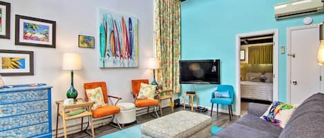 Find your ocean-side paradise at this colorful Dewey Beach vacation rental!