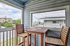 Enjoy a glass of wine out on the deck with the ocean as your backdrop!