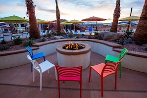 Poolside fire pit is perfect for evening s'mores and swimming