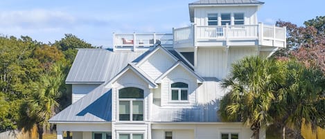 Beautiful home with balconies galore. View of the Gulf from the top balcony.