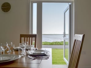 Dining area with lovely views | Rockworks Chalets No. 2 - Rockworks Chalets, Holm, near Kirkwall