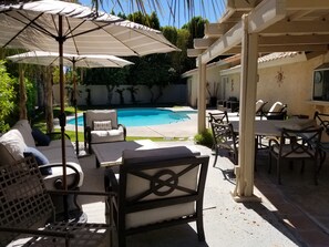Patio Seating and Shaded Dining by the Pool