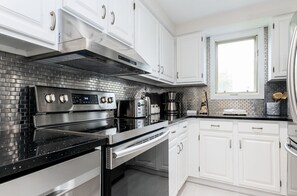 Full Kitchen with
Oven
Full Fridge
Microwave
Dishwasher
Large sink
Coffee Maker
Kettle
Toaster
& More