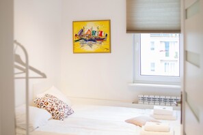 The bedrooms' elegant decor creates a serene and restful environment.