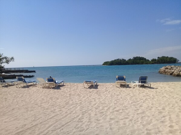 Lovely beach with a view of a small island (Booby Cay)