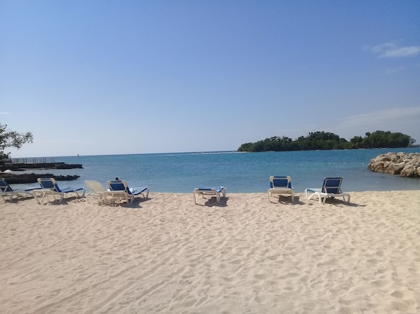 Lovely beach with a view of a small island (Booby Cay)