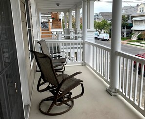 Front and rear porch balconies are relaxing on tree lined peaceful 2nd street.