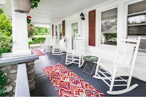 Front porch perfect for your morning coffee. 