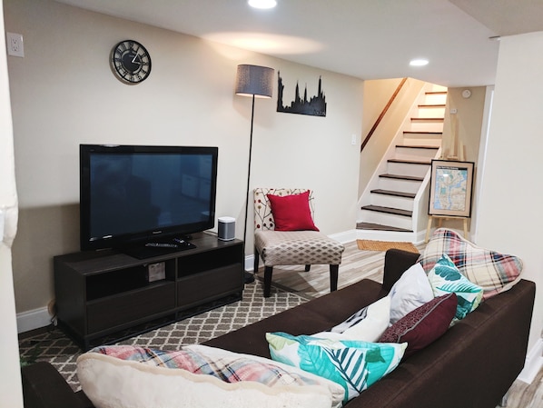42 inch TV , sofa