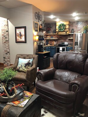 Cozy open living area, including a coffee bar and dining area (not pictured).