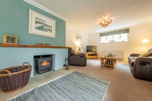 Hideaway House, Wells-next-the-Sea: Sitting room featuring a wood burning stove