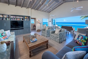 Westshore Beach House - Spacious living area with oversized comfy sofas