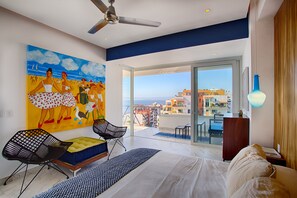 Master bedroom looks out onto balcony