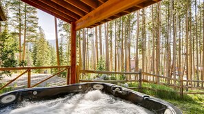 Private 6 person hot tub under cover with Mountain Views
