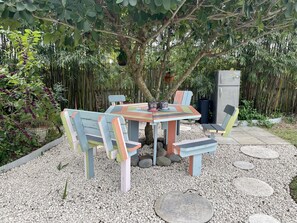 Outdoor seating with refrigerator