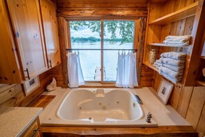 Main floor bath - jetted tub overlooking the lake.