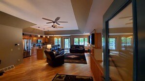 Open concept living , dining room, kitchen.  Overlooking the Lake.