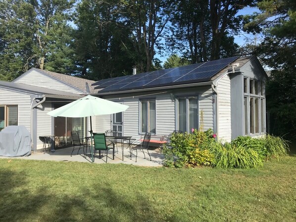 Backyard patio with seasonal views of Pack Monadnock.