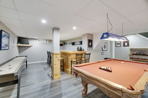 Shuffleboard with 2 Smart TVS, perfect for all sporting events