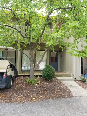 Front door with porch.