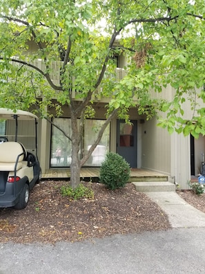 Front door with porch.