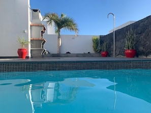 Swimming pool and BBQ on lower terrace