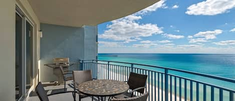 Enjoy a meal on this large balcony with grill!