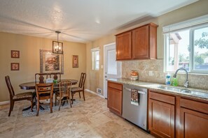 Dining table and dishwasher