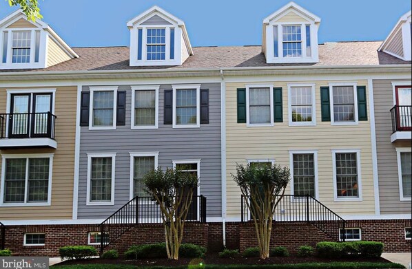 View of front on our home (yellow).