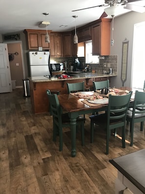 Kitchen fully furnished with keurig and a regular coffee pot