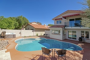 Back yard and rear view of property