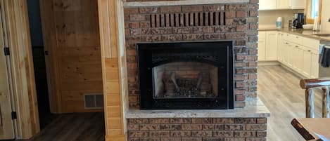 Fire place by kitchen