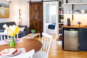 The living room/kitchenette when you first walk into the unit.