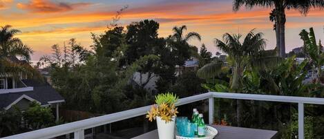 Vibrant Sunsets from the Main Level Ocean View Balcony. 